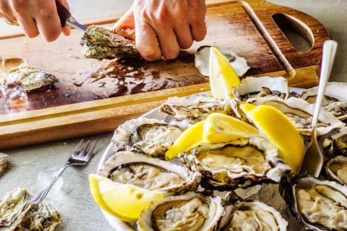 oysters being shucked