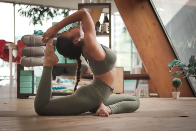 Girl doing yoga in studio 