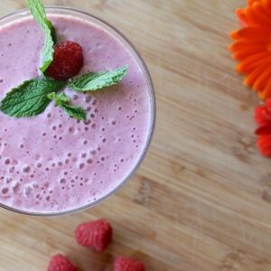 raspberry smoothie with a mint garnish