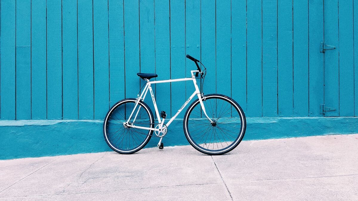 bike against a blue wall